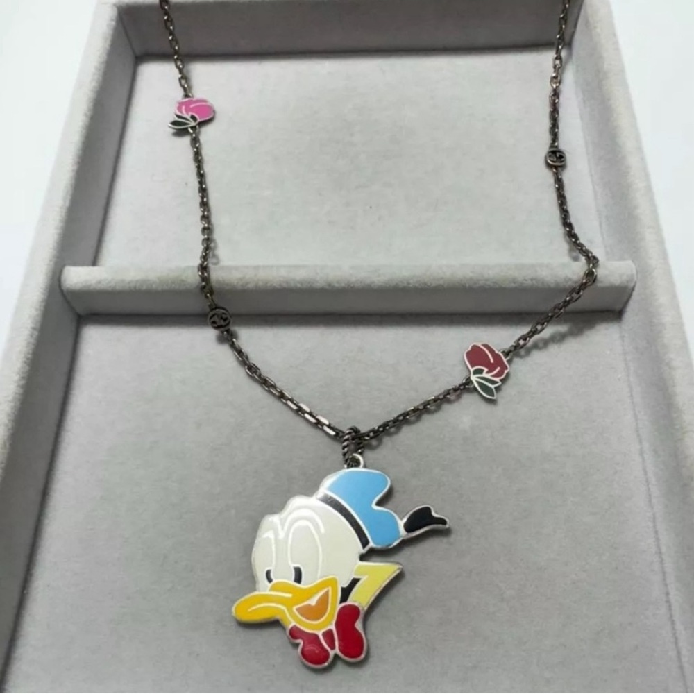 Gucci X Disney Silver Donald Duck Pendant
Necklace - 27" - Picture 3 of 12